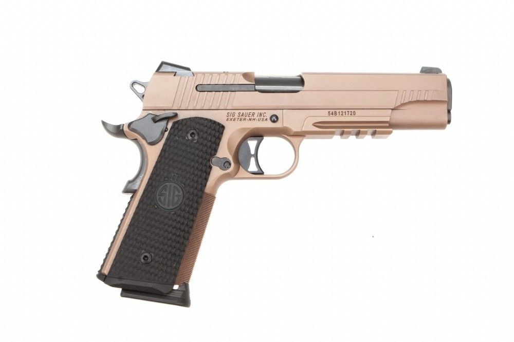 Sig Sauer Emperor Scorpion 1911. A sexy gun that focuses more on fashion than ultimate tactical performance. But it looks amazing.