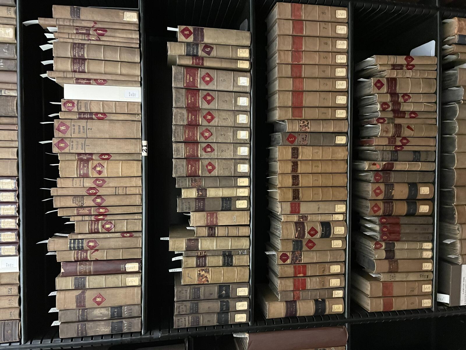 Rare books shelf at the Indiana Supreme Court Law Library — the legal aftermath of a defensive shooting