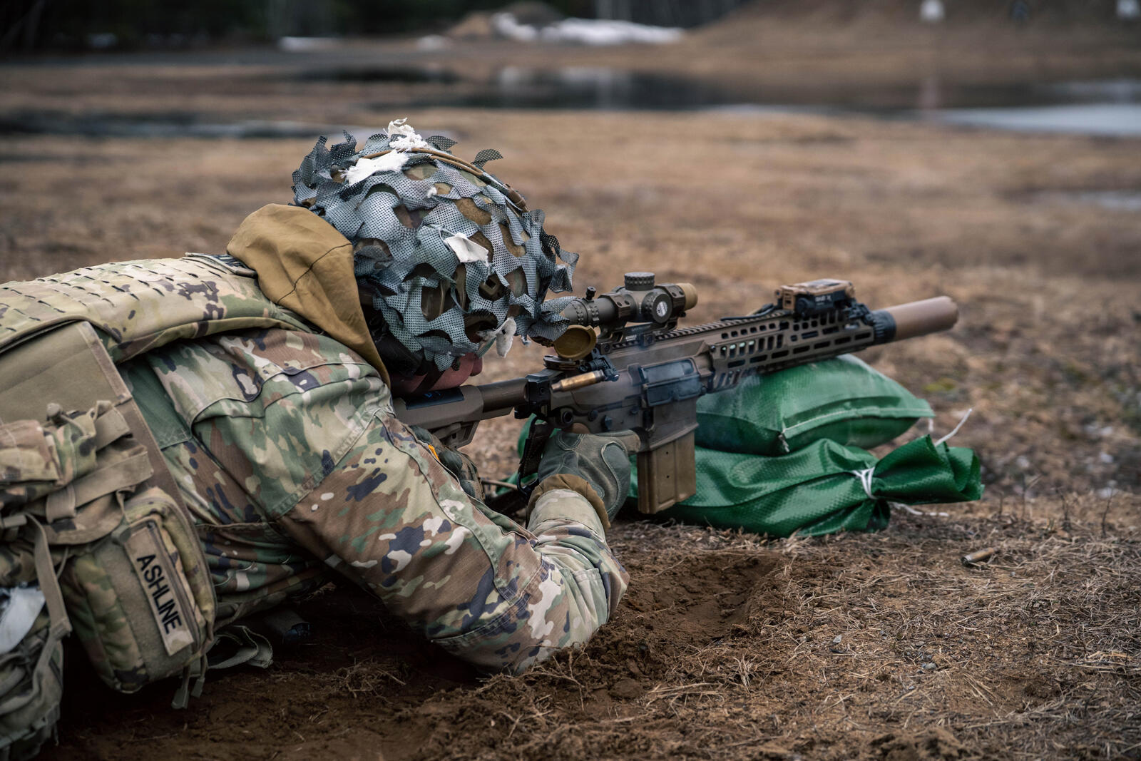 How the Military Buys Its Guns: Procurement, Contracts & Politics (2026) 1 Non-commissioned officers of 1-32 Infantry test the SIG XM7 rifle and XM250 automatic rifle during Next Generation Squad Weapon evaluation
