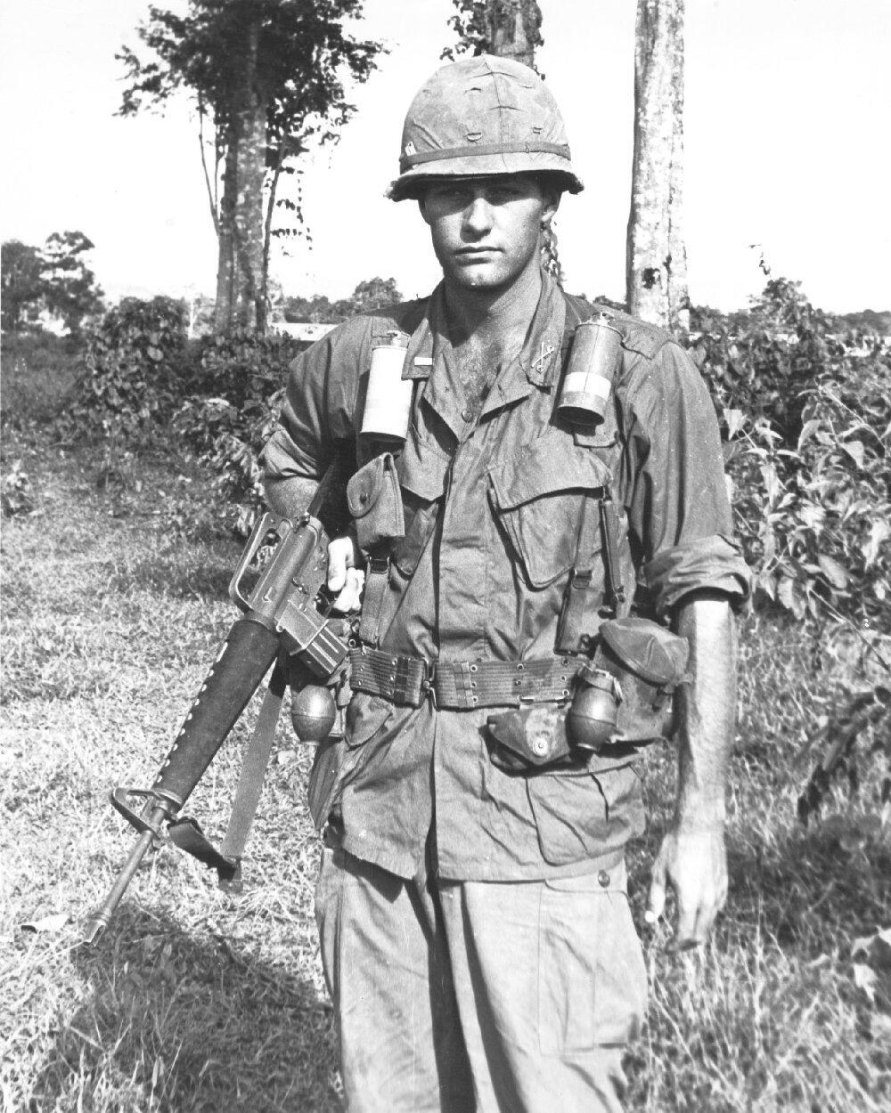 A U.S. infantryman carrying an M16 rifle in Vietnam