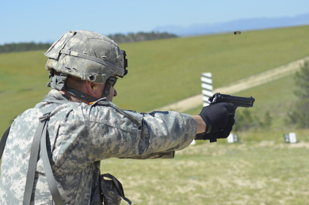 How the Military Buys Its Guns: Procurement, Contracts & Politics (2026) 11 U.S. Army soldiers of the 235th Military Police Company qualifying with the Beretta M9 service pistol, 2016