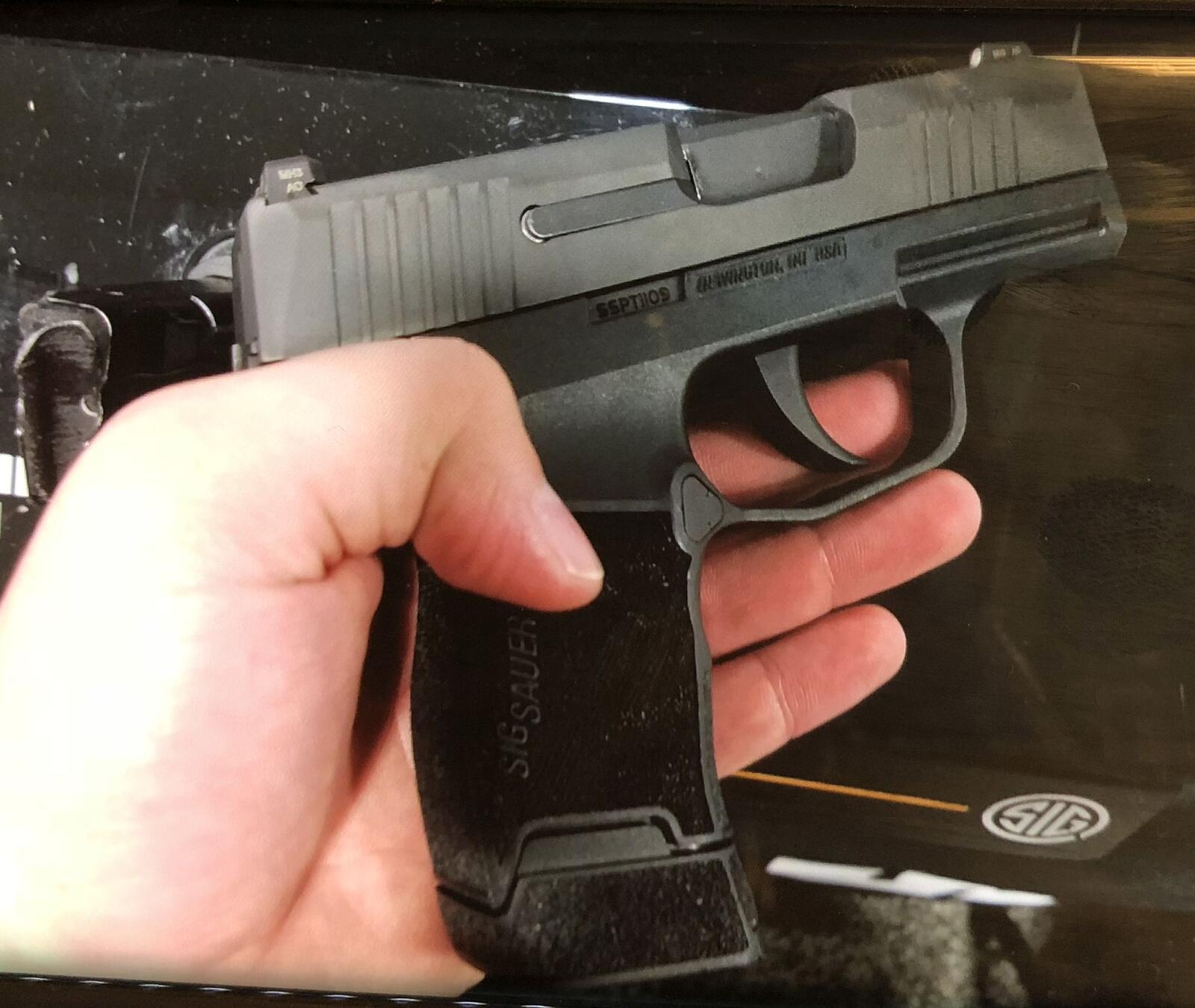 How to Choose a Gun for Self-Defense: Complete Guide (2026) 6 SIG Sauer P365 subcompact 9mm pistol — the dominant modern CCW class for serious daily carry