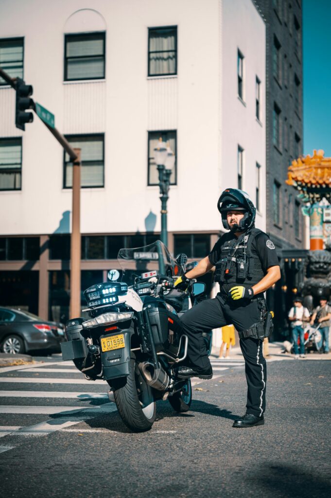 A cop wears body armor on duty.