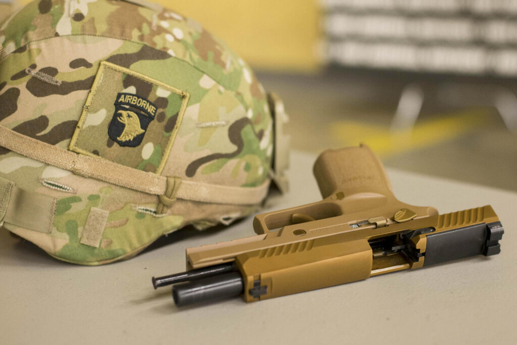 Specialist Firearms for Law Enforcement: The Complete Guide (2026) 5 SIG Sauer M17 service pistol — the military version of the civilian P320 that has displaced the Beretta M9 and is being adopted by police agencies