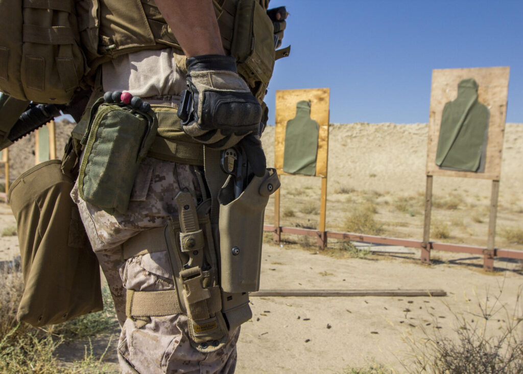 Competition Shooting: The Complete Guide for Beginners 3 Practical pistol competitor drawing from the holster