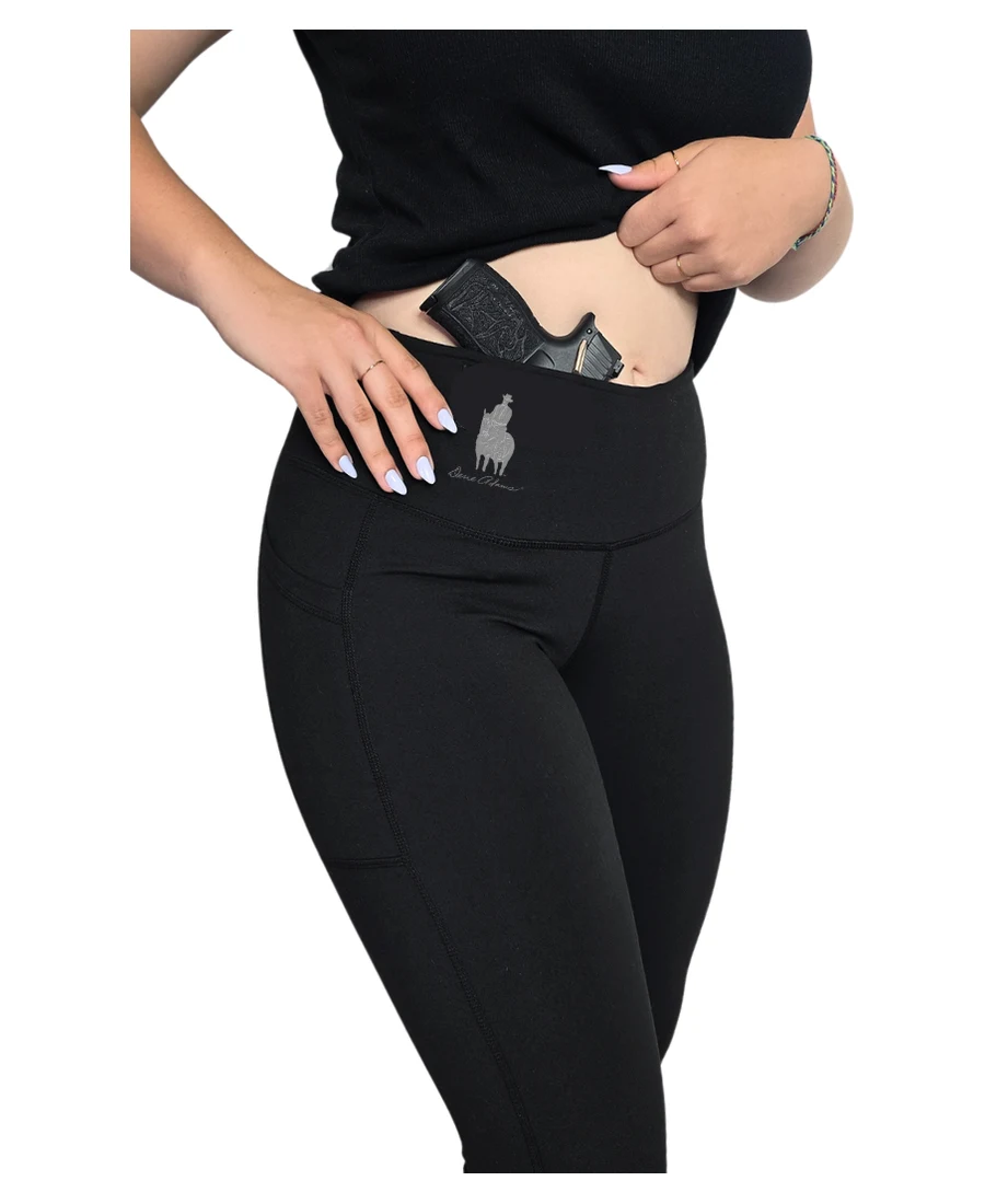 Dene Adams concealed carry leggings with a sub-compact pistol in the waistband holster compartment
