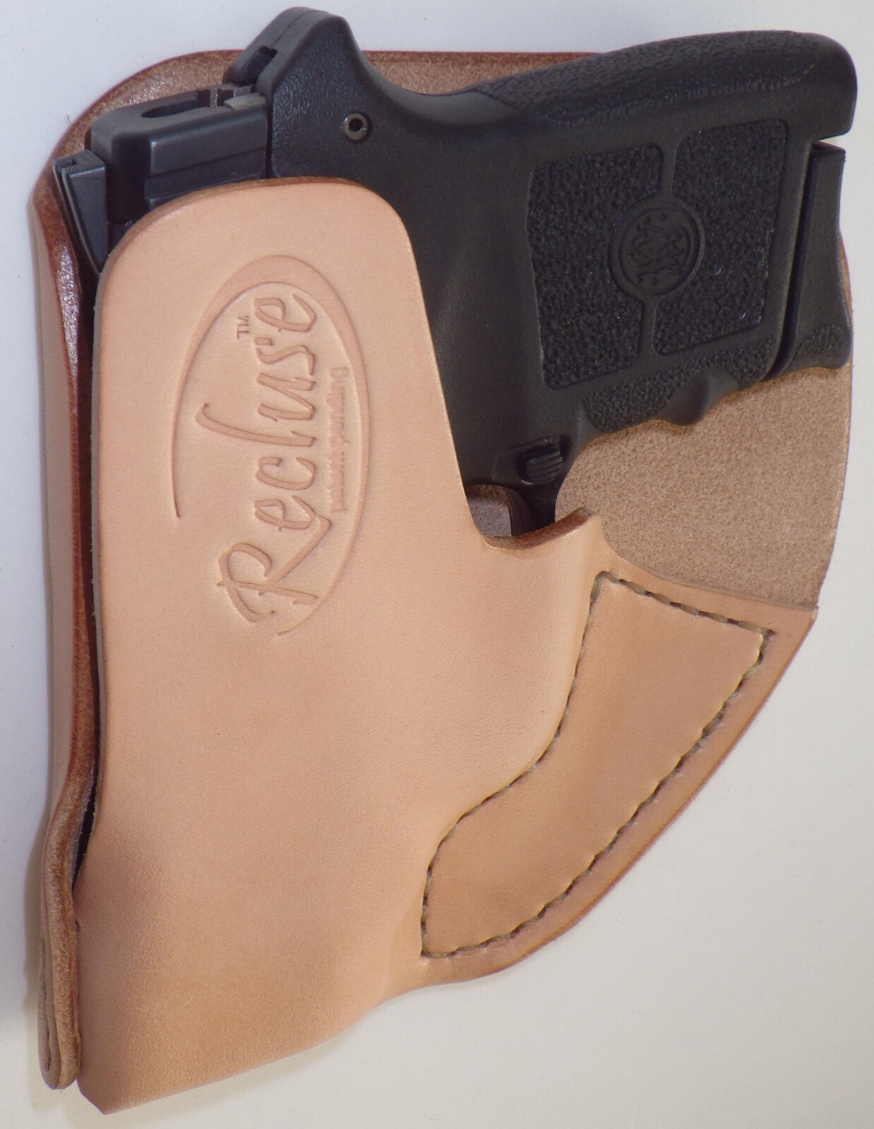 8 Best Pocket Holsters in 2026: Tested for Draw Speed and Concealment 14 Recluse hook system pocket holster