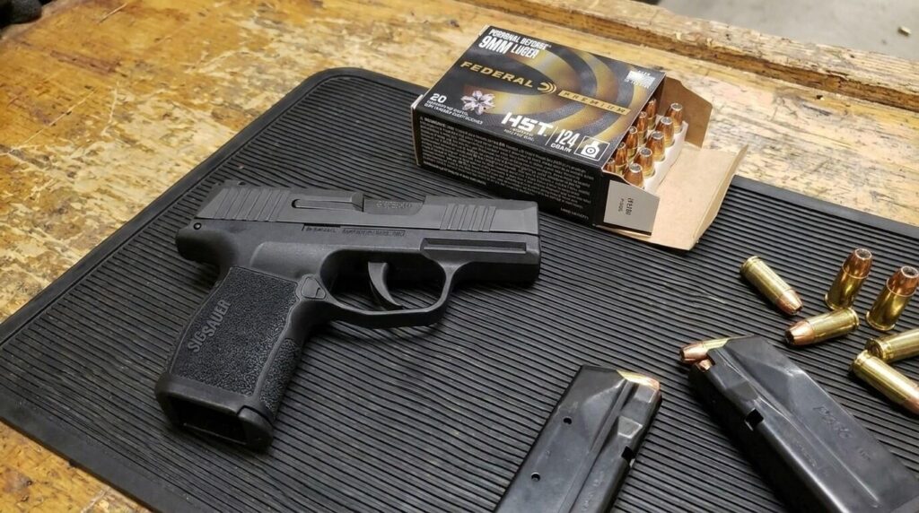 Canik Mete MC9 vs Sig P365: Budget Contender vs the King (2026) 6 Sig Sauer P365 micro-compact 9mm pistol product photo