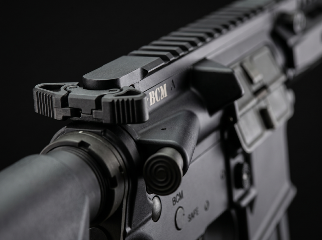 BCM RECCE-16 MCMR Review (2026): 1,500-Round Test of the Duty-Grade Workhorse 11 BCM Gunfighter ambi charging handle macro detail with BCM star etching, lower receiver markings visible