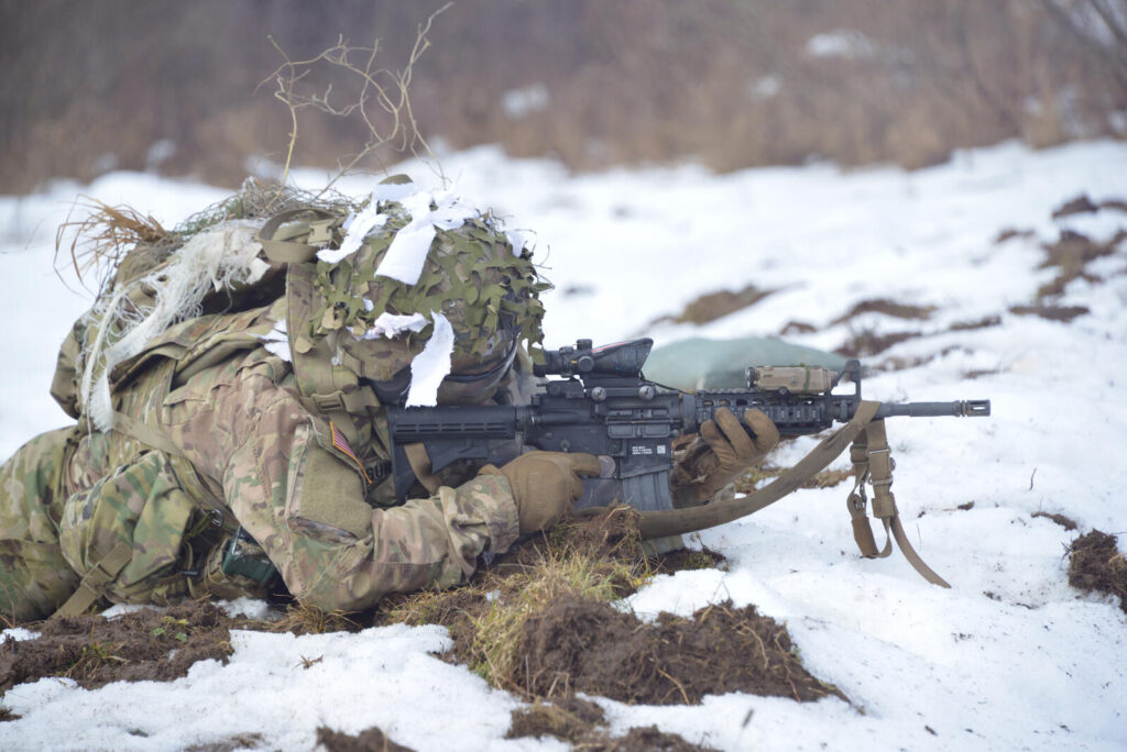 How Firearms Changed Warfare: From Muskets to Modern Combat (2026) 15 Paratroopers of the 2-503rd Infantry Battalion (Airborne) training with M4 carbines fitted with optics and rail accessories