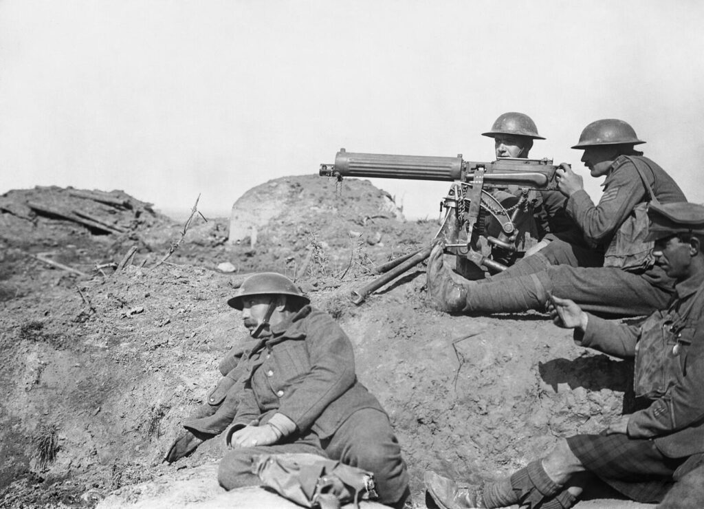How Firearms Changed Warfare: From Muskets to Modern Combat (2026) 12 British Vickers machine gun crew with respirators during the Battle of Passchendaele, September 1917