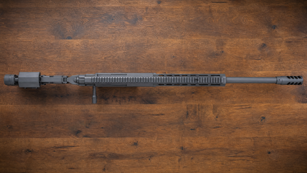 Noreen ULR Review (2026): The Lightweight .50 BMG for Long Range 12 Noreen ULR 2.0 top-down view showing the Noreen muzzle brake 1.25-12 thread M-LOK handguard and full-length Picatinny rail