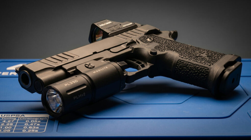 Best Weapon Lights in 2026: Pistol & Rifle Picks Tested 24 Modlite PL350 with PLHv2 head on competition 2011 pistol with Holosun 507COMP red dot on USPSA mat