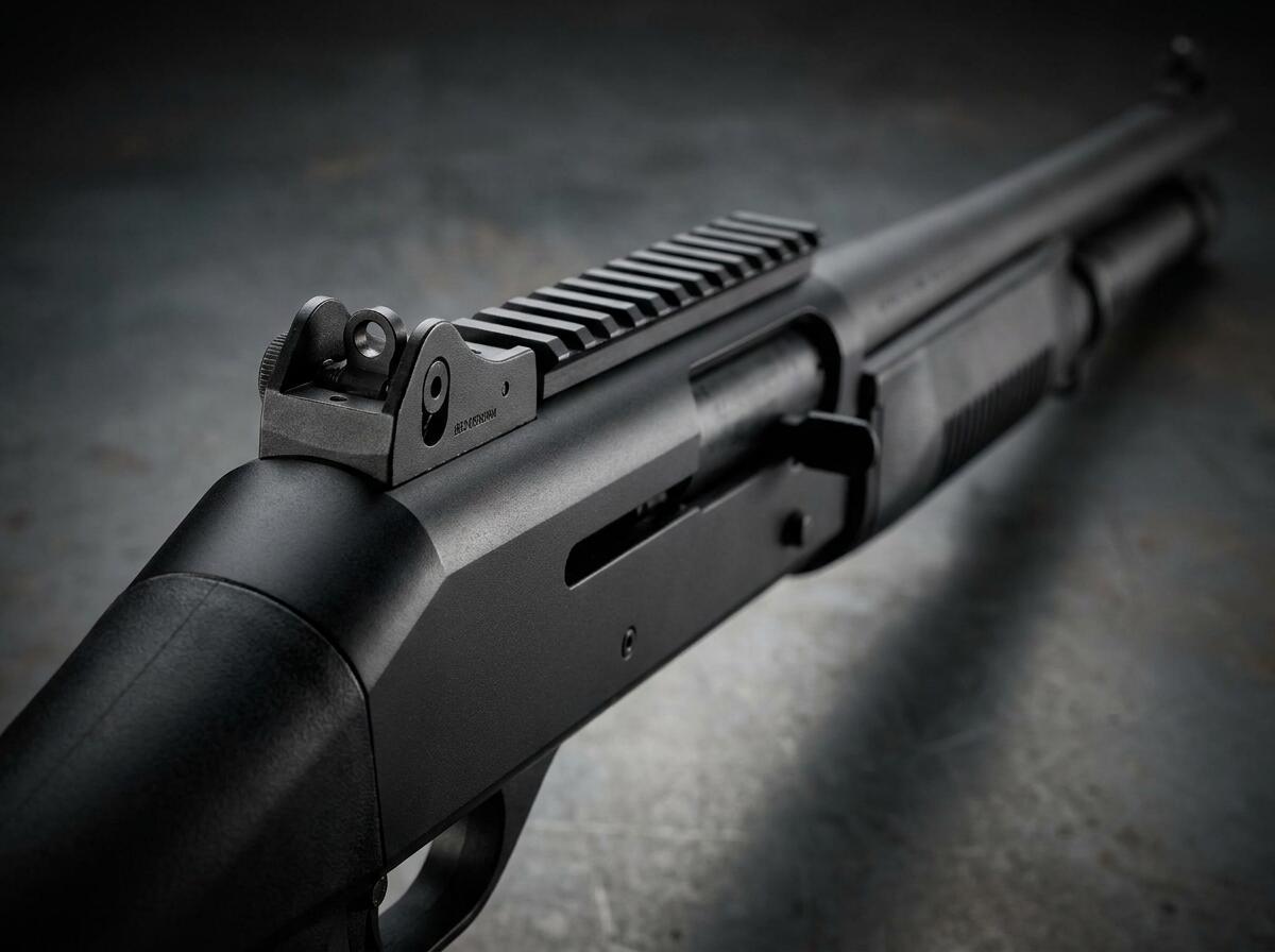 Benelli M4 receiver and factory ghost ring sight