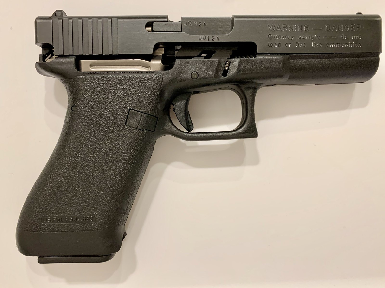10 Firearms Myths People Still Believe (and the Truth Behind Them) 4 Cutaway of a striker-fired pistol showing the internal fire-control and drop-safety mechanism