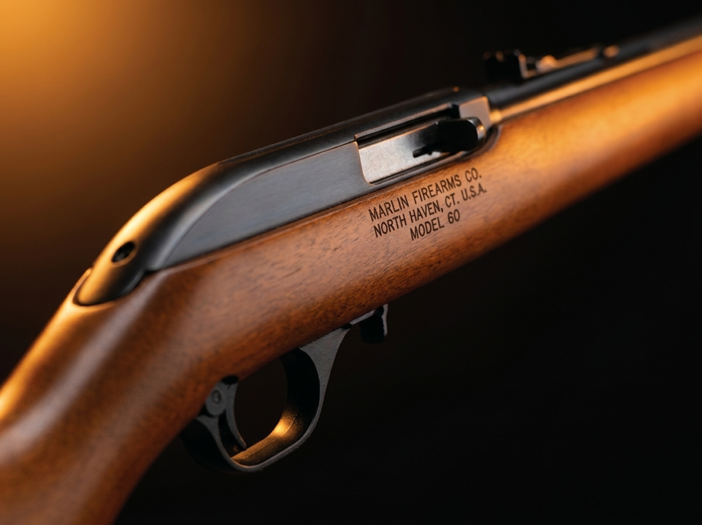 Marlin Model 60 Review (2026): The Best-Selling .22 Ever, Tested 5 Macro of the Marlin Model 60 receiver and ejection port on the hardwood stock