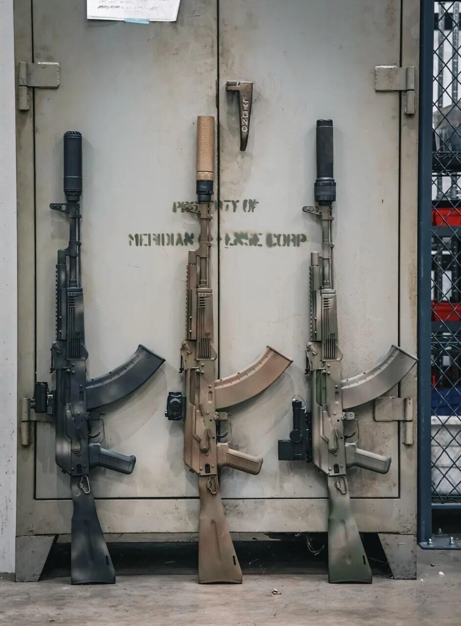 Meridian Trench-103: The Hand-Painted American AK-103 1 Meridian Defense Corp Trench-103 AK-103 rifle with a hand-applied battle-worn Cerakote finish and folding polymer stock