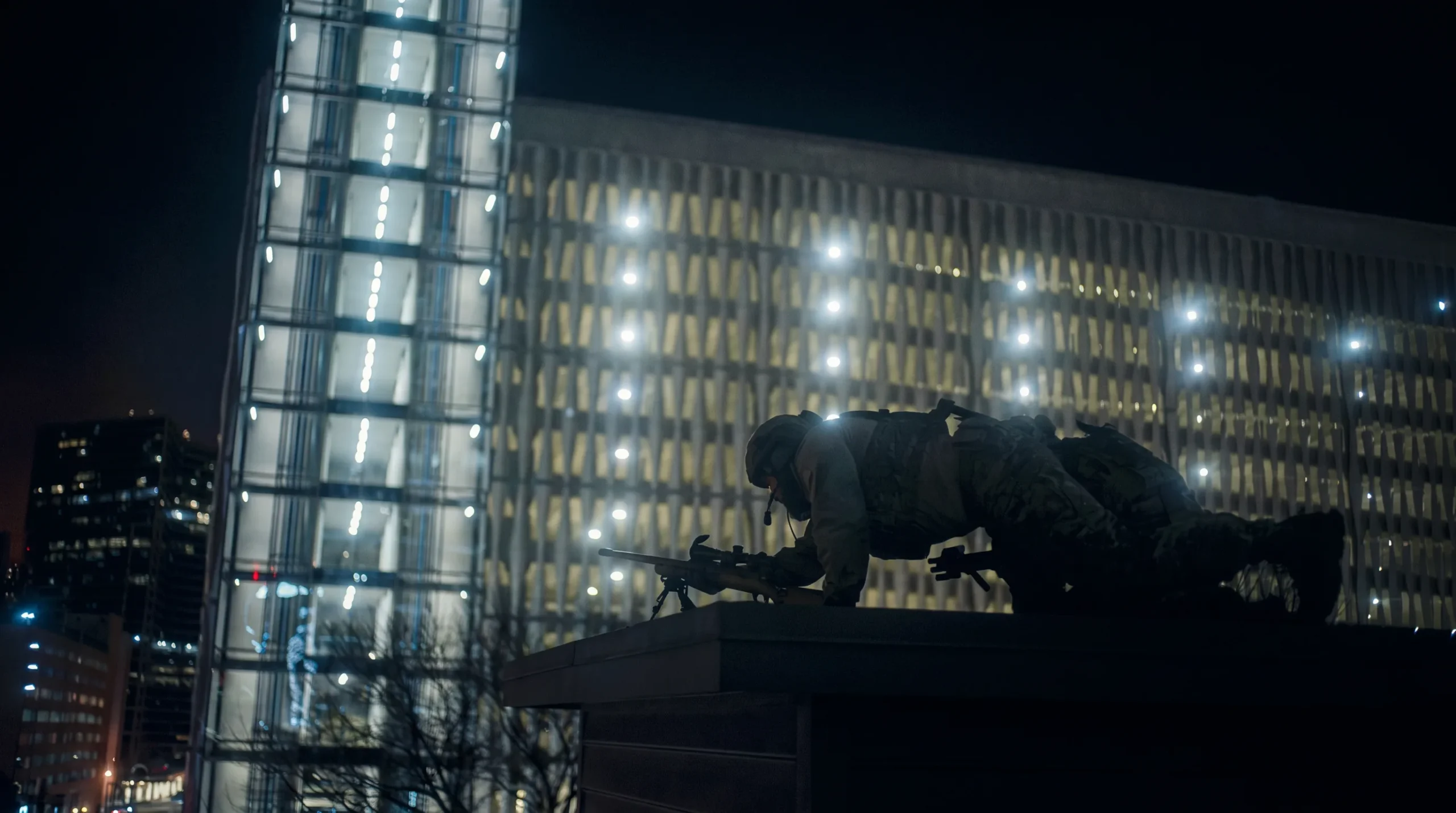 A sniper prone on a rooftop with the Aero Precision M5E1 build in Civil War