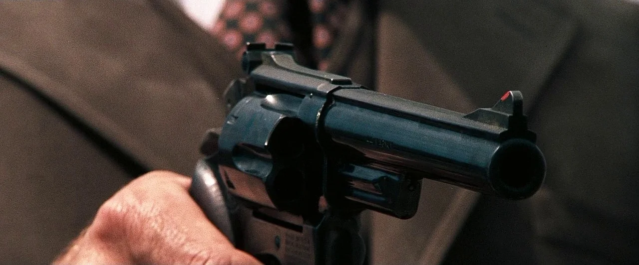 Close-up down the barrel of Harry Callahan Smith and Wesson Model 29 44 Magnum in Dirty Harry
