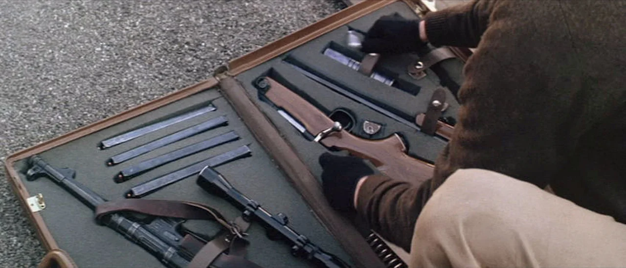 Scorpio case containing the disassembled Arisaka takedown rifle, suppressor, an MP 40 and spare magazines in Dirty Harry