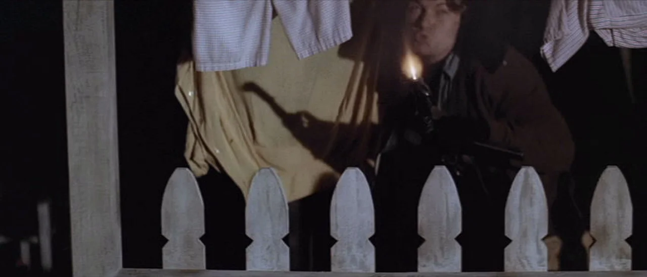 Scorpio firing a German MP 40 submachine gun during the rooftop shootout in Dirty Harry