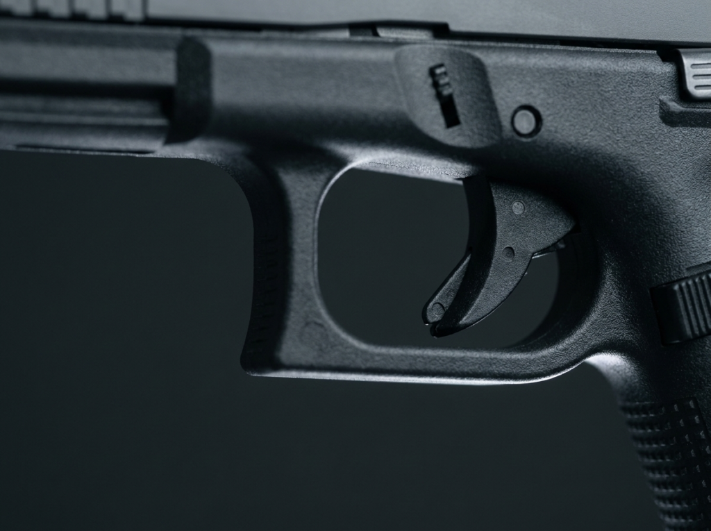 Close-up of the Glock 22 trigger and Safe Action trigger safety blade