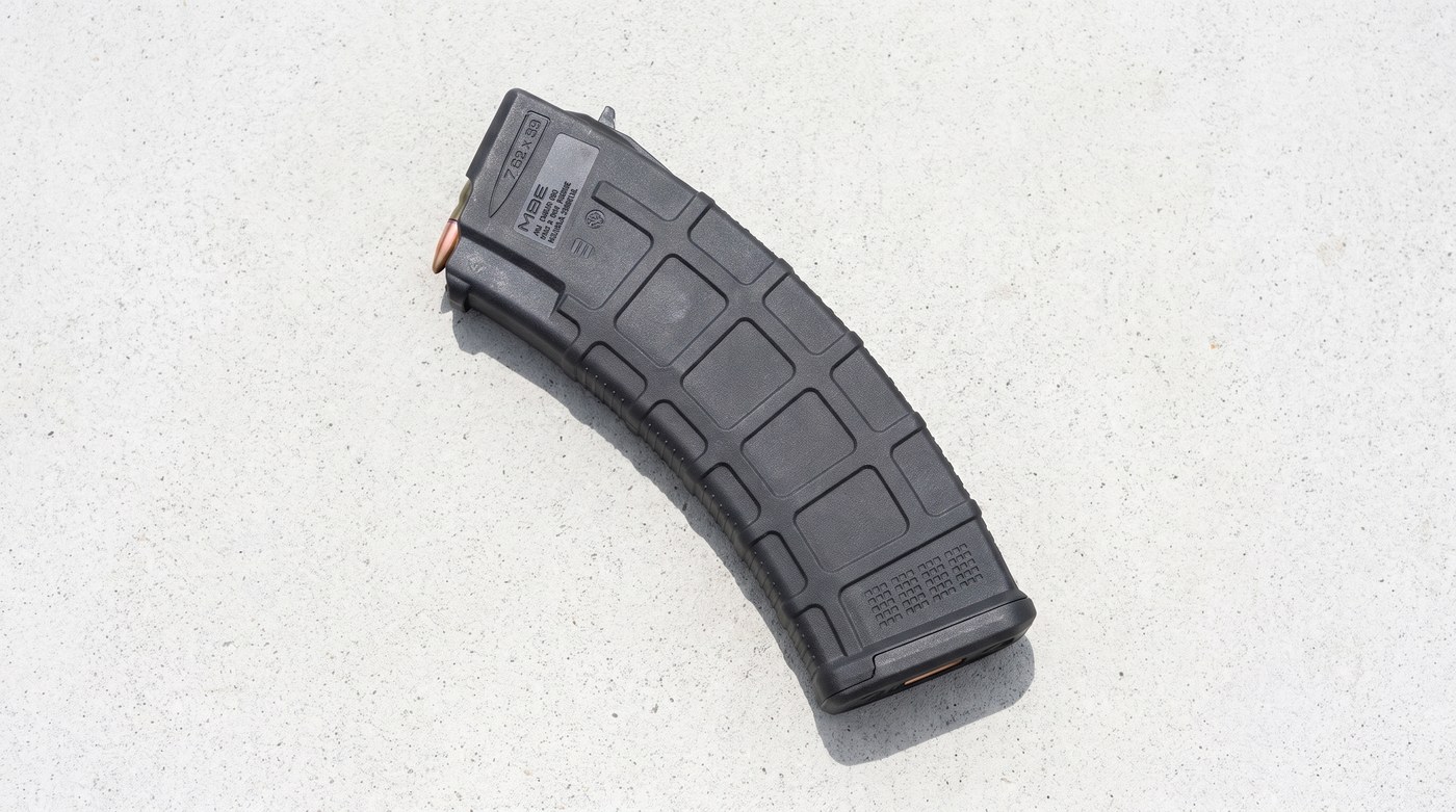 Magpul PMAG 30 AK/AKM MOE 7.62x39 magazine viewed from above on a concrete surface
