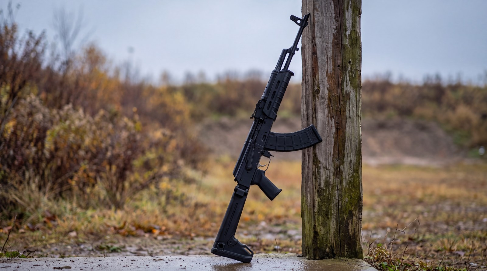 PSAK-47 GF3 rifle in 7.62x39 resting against a post at an outdoor range