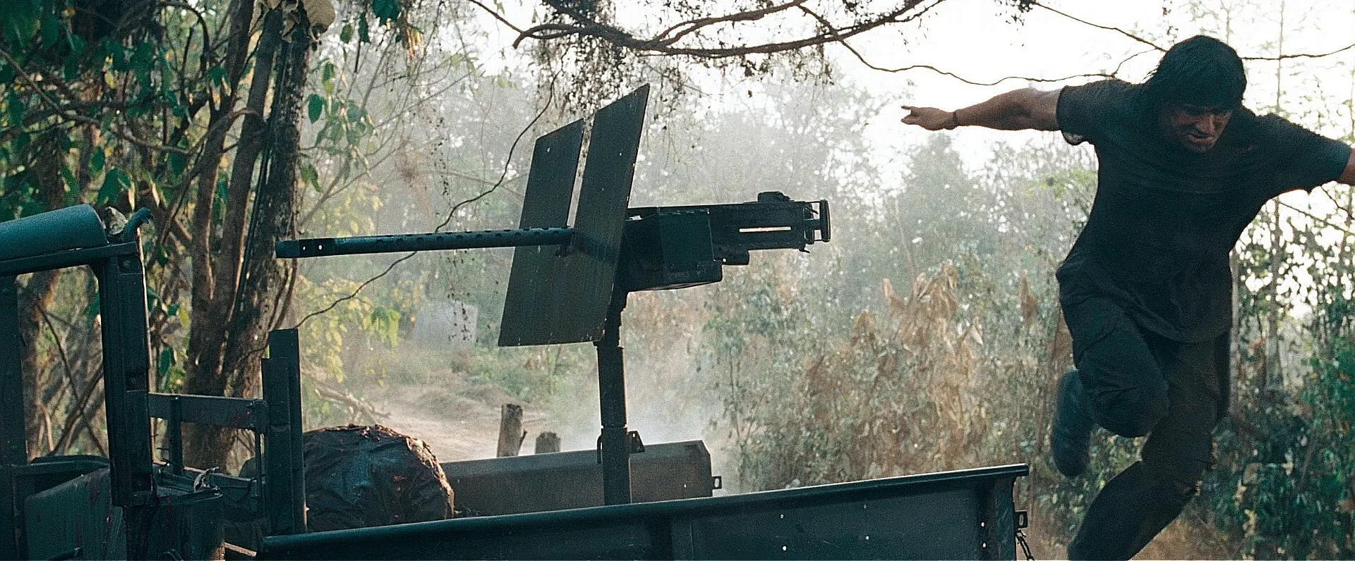 The truck-mounted .50 AN/M2 with its armoured shield and perforated barrel shroud in the Burma finale of Rambo (2008)