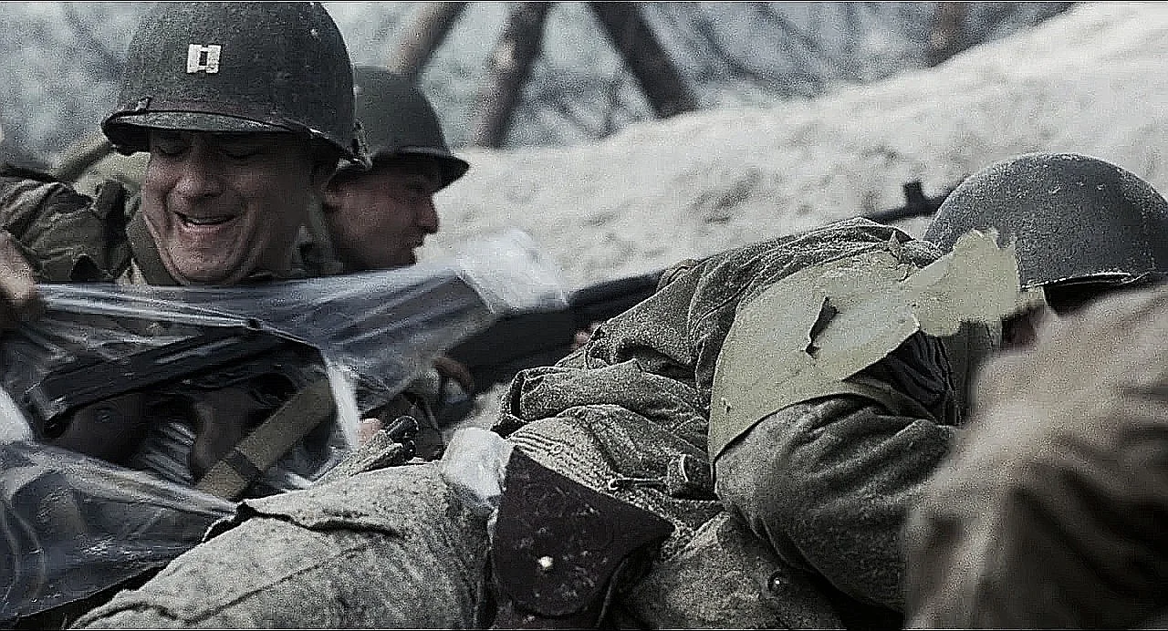 Captain Miller tearing the clear Pliofilm wrap off his M1A1 Thompson on Omaha Beach in Saving Private Ryan