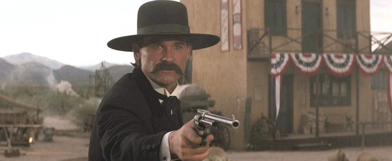Wyatt Earp aiming his long-barreled Buntline Special during the O.K. Corral shootout in Tombstone