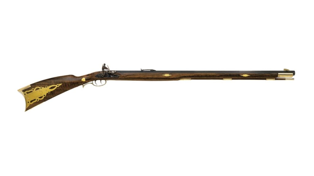 Traditions Pennsylvania flintlock rifle with long barrel, ornate brass patchbox and brass star inlays