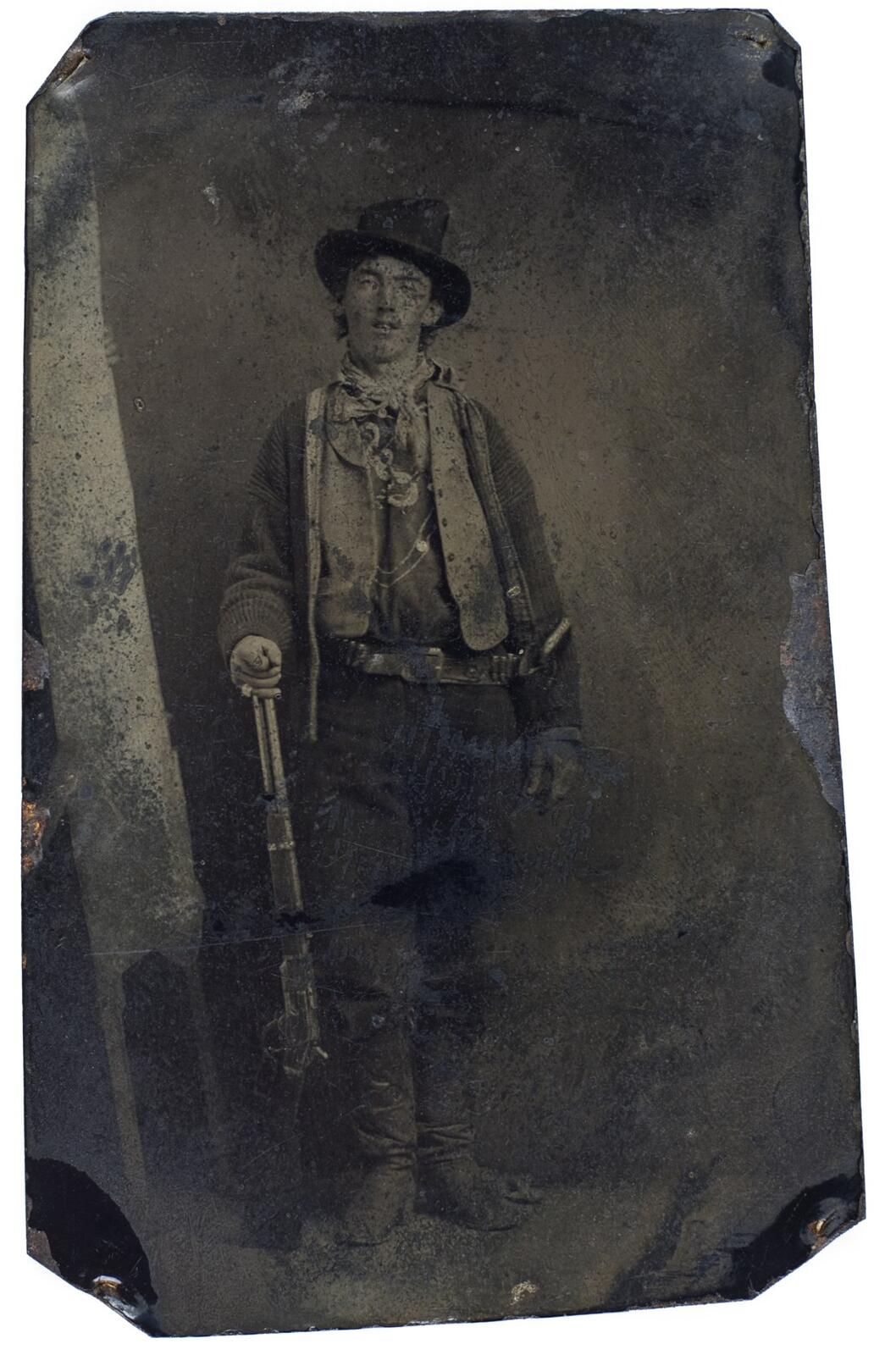 The original unrestored Fort Sumner tintype of Billy the Kid, about 1880, showing the reversed image with the revolver on his left hip