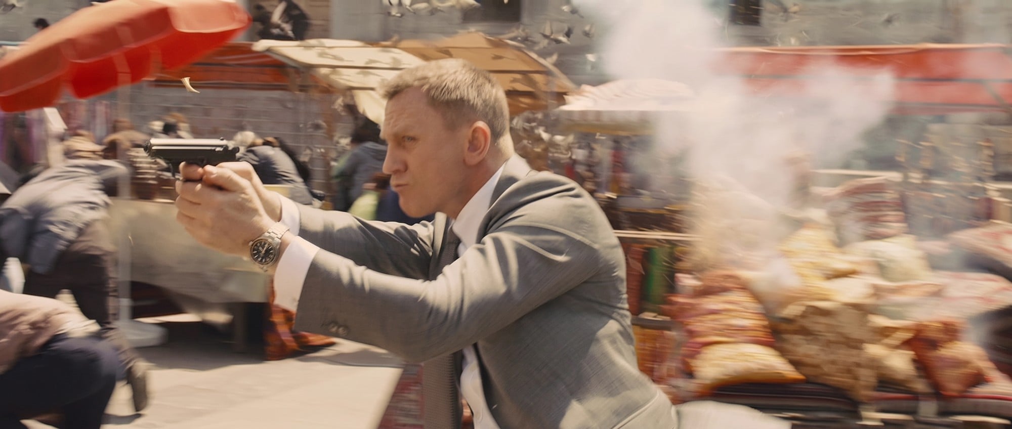 James Bond firing a Walther PPK during the market chase in Skyfall