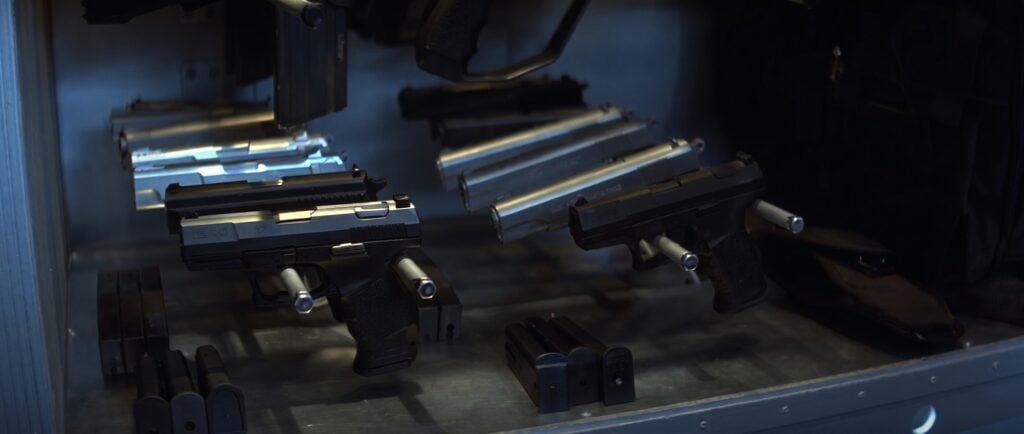A rack of Walther P99 pistols and magazines in Wai Lin hidden armory, Tomorrow Never Dies