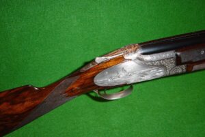 Engraved Browning B25 Superposed over-and-under 12 gauge shotgun receiver