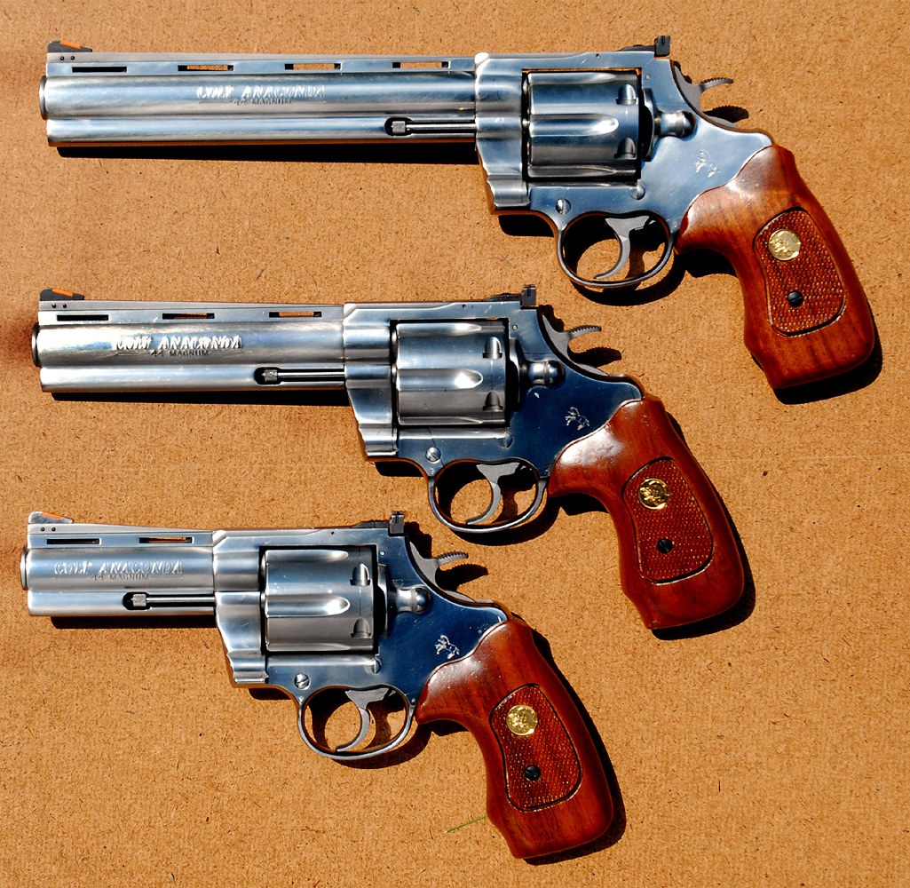 Three stainless Colt Anaconda .44 Magnum revolvers with different barrel lengths