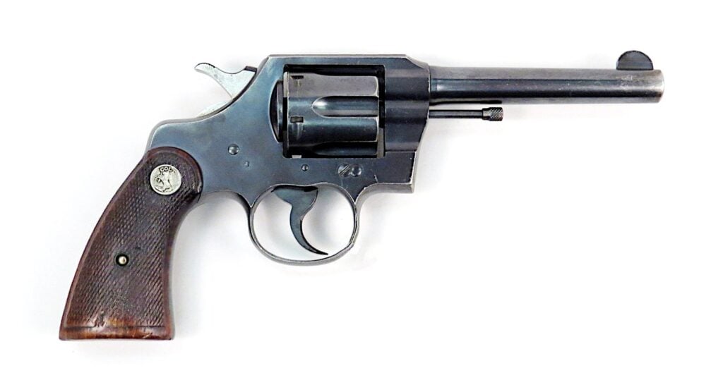 Colt Official Police .38 Special revolver with checkered wood grips
