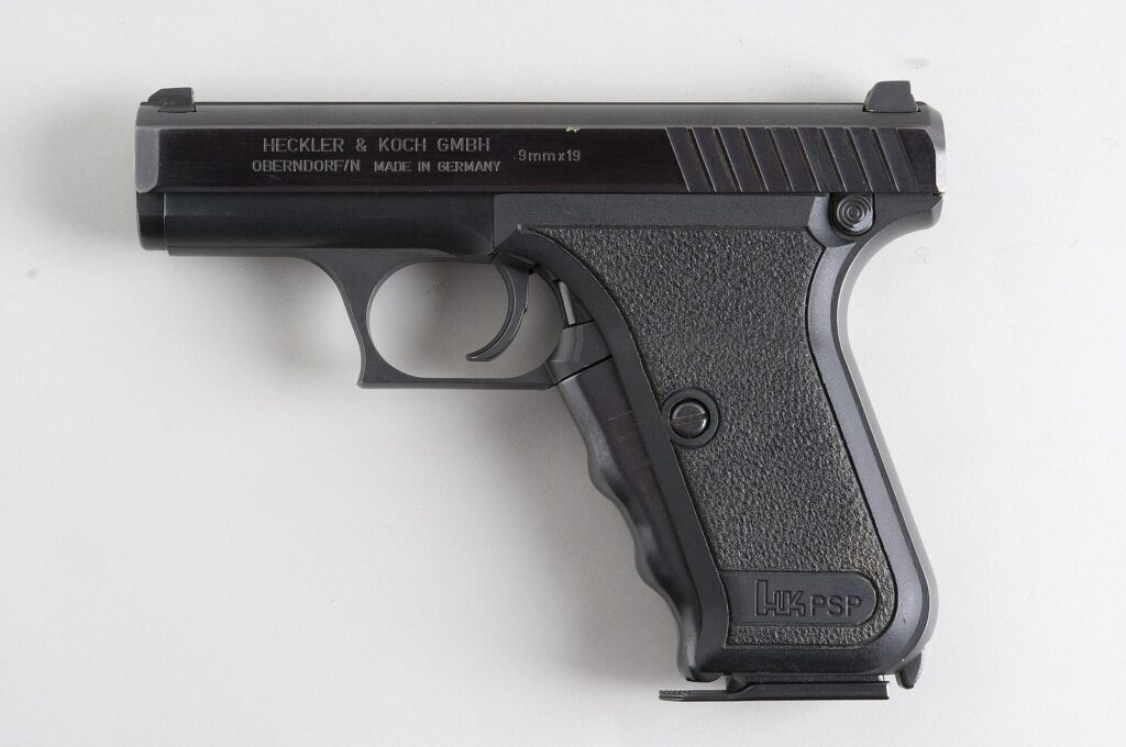 Heckler & Koch P7 squeeze-cocker 9mm pistol marked PSP, left side