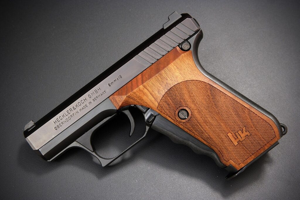 Heckler & Koch P7M13 squeeze-cocking 9mm pistol with wood grips