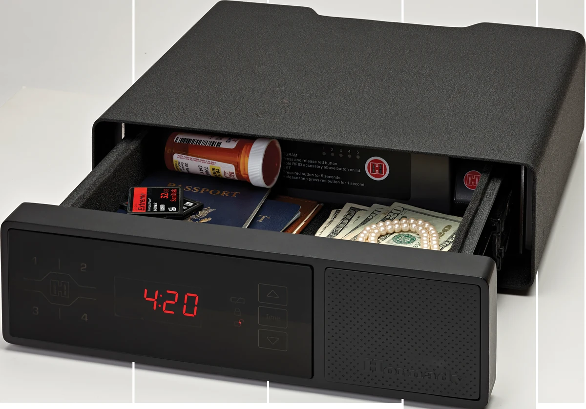 Hornady RAPiD Safe Night Guard with the spring-assist drawer open, clock display and RFID panel visible