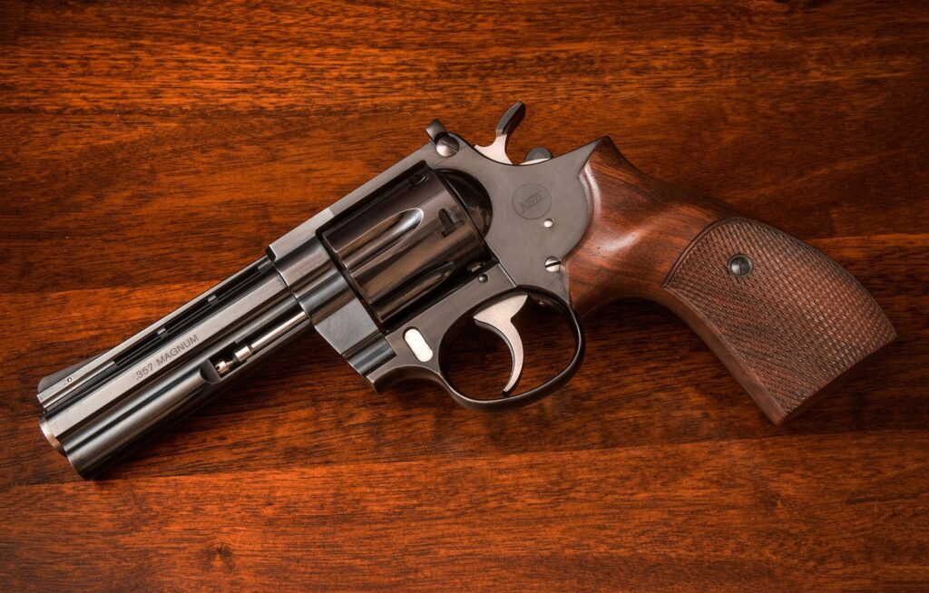 Korth Combat .357 Magnum revolver with 4-inch barrel on a walnut table