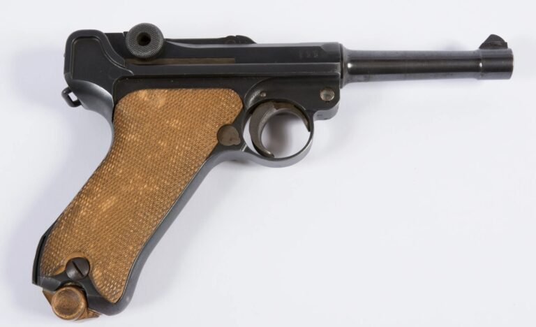 WWI Luger P08 pistol made by DWM in 1918, left side, with wooden grips