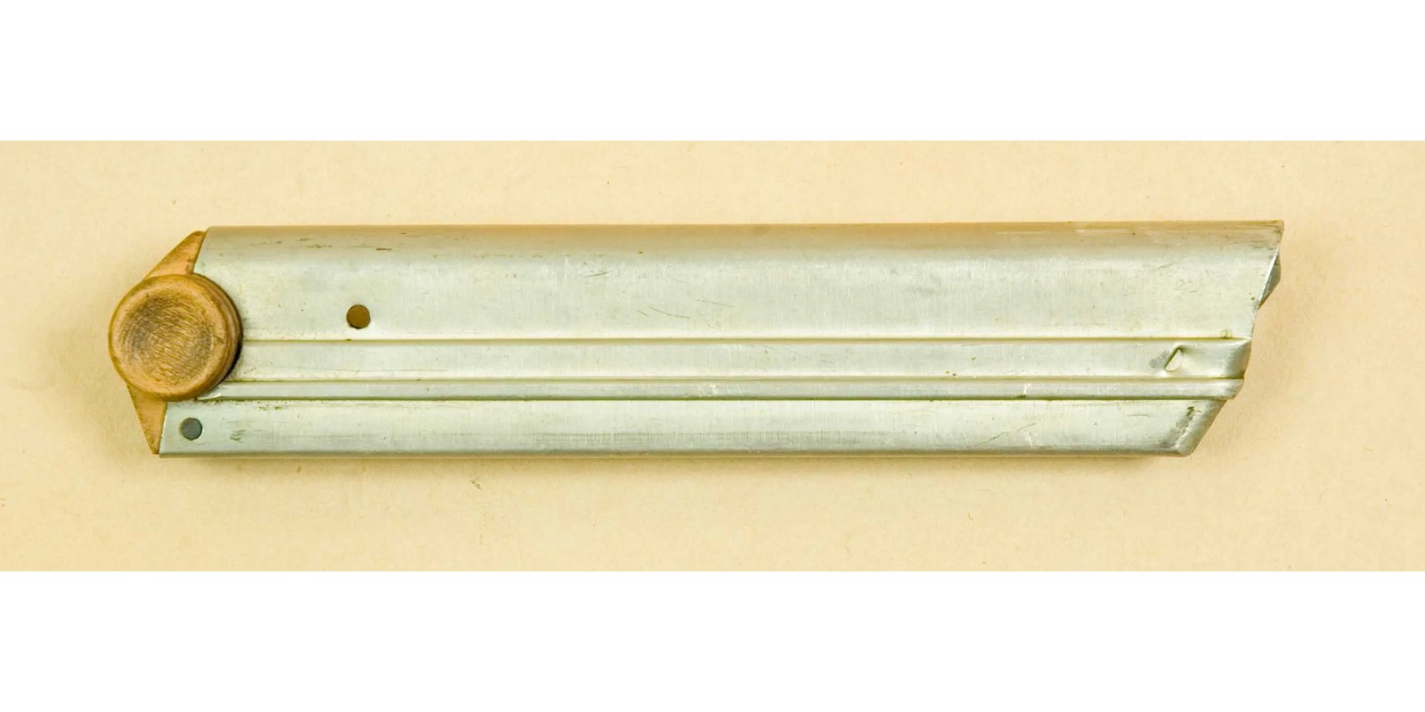 Original Luger P08 magazine with wooden base plug