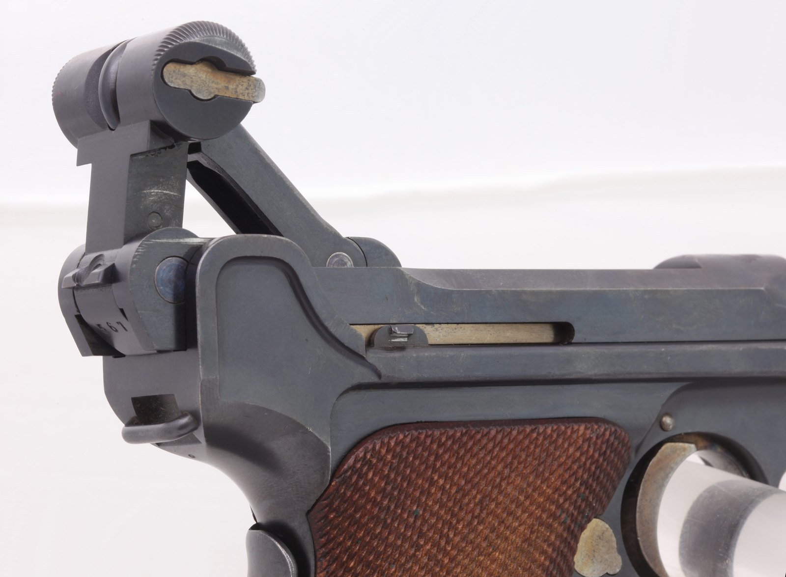 Luger toggle action raised open showing the toggle links and frame