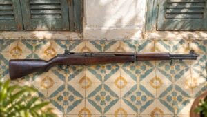 M1 Garand rifle on a tiled verandah of a French colonial villa in morning light
