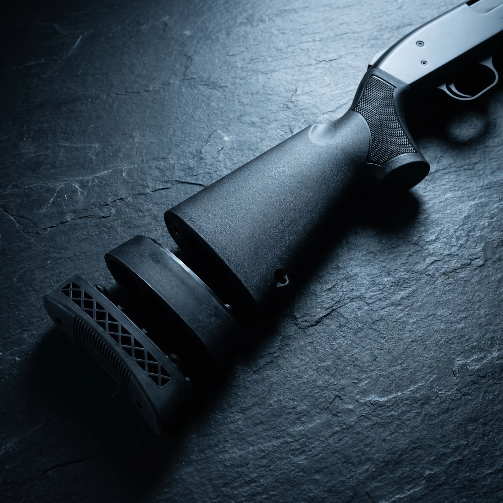 Close up of the Mossberg 510 buttstock with the recoil pad and one inch length of pull spacer removed