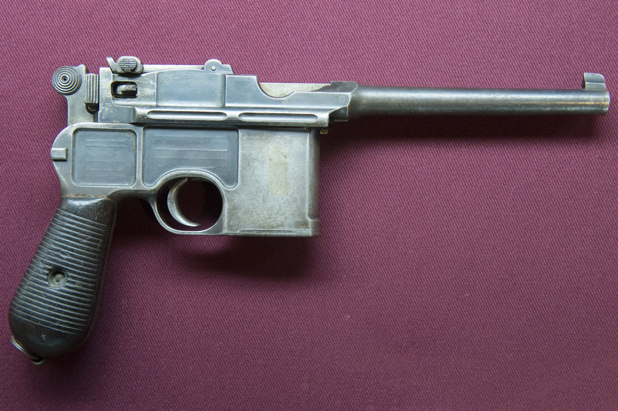Early cone hammer Mauser C96 with a ringed conical hammer and milled frame panels, right side