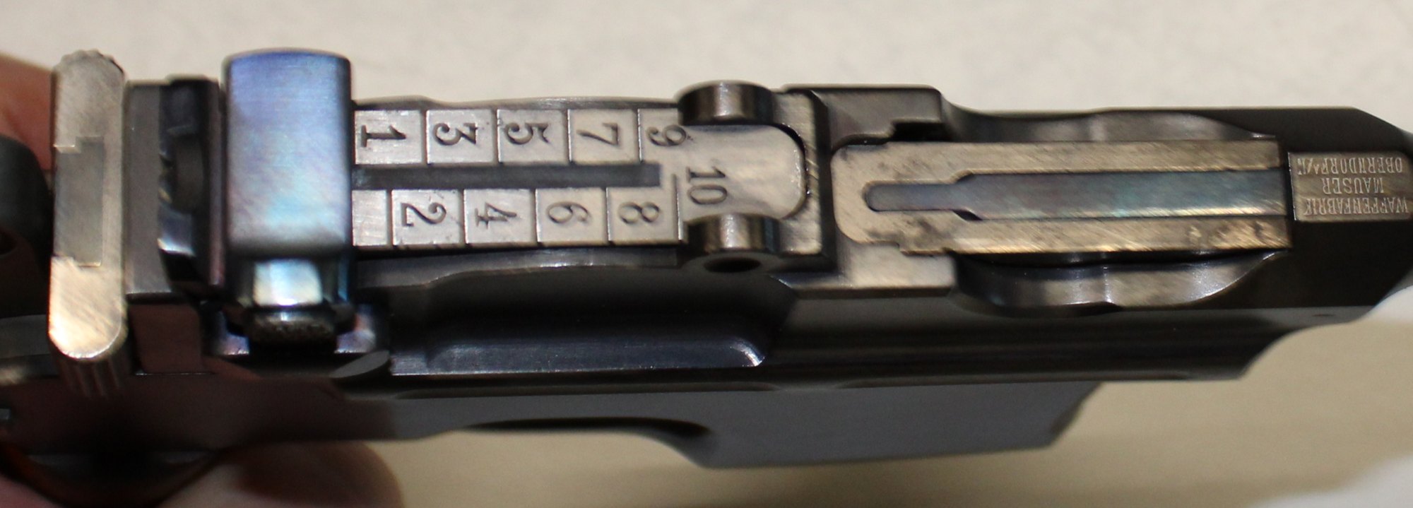 Top view of a Mauser C96 tangent rear sight graduated from 1 to 10, for 100 to 1,000 meters