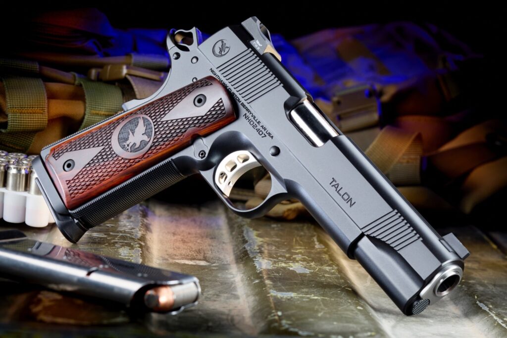 Nighthawk Custom Talon Government 1911 pistol with engraved grips